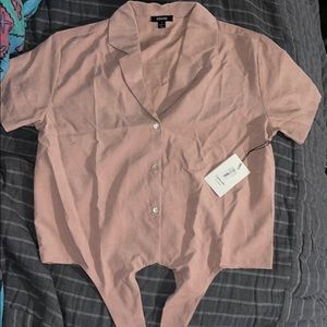 Button down with tied knot at the bottom